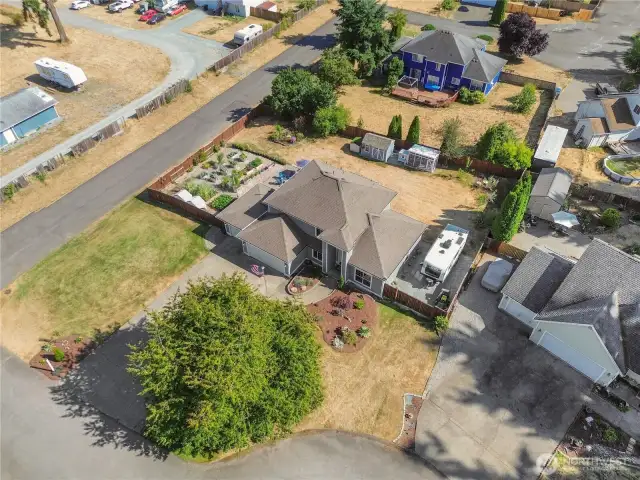 Lots of space between neighbors on this large corner lot.