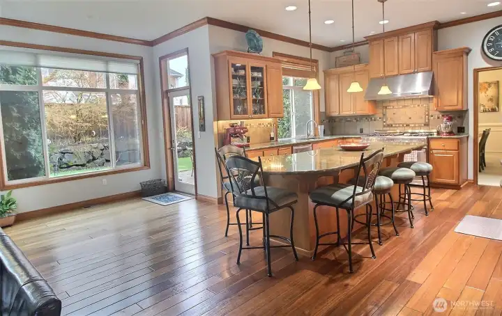 All part of the Great room includes the Kitchen, tall 3-sided windows for the breakfast nook, and a huge Family room (not shown in this image).