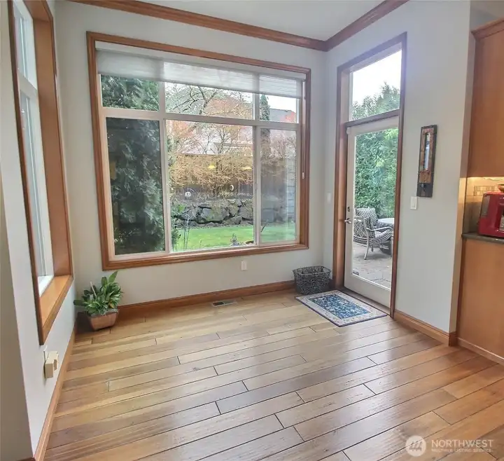 Bright & Large Breakfast nook surrounded by windows and your garden!