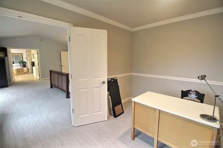 Looking out from the adjoined room to the Primary Bedroom.