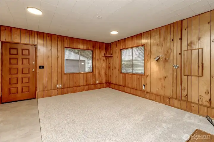 Note: Family Room was a 2 car garage in the past it is converted to living space so front garage is truly 1/2 garage great for storage workshop or hobby room. New carpet & flooring.