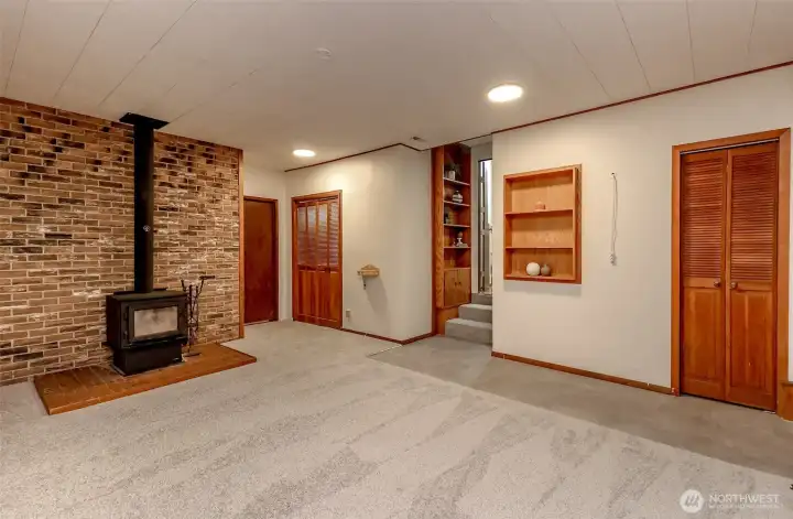 Huge Family Room with wood burning stove. It's a fantastic space perfect for cozy evenings and gatherings.