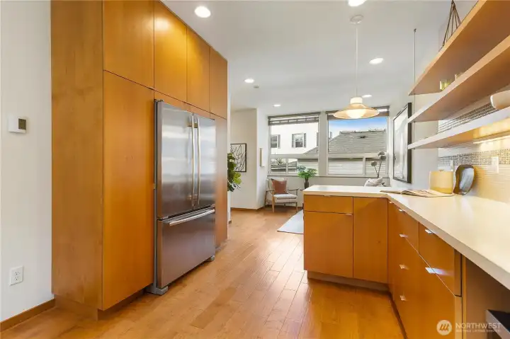 Despite big open shelves, still tons of closed storage and pantry space.