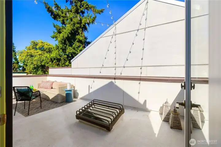 Rooftop deck has hot and cold water connections, gas, and electrical outlet.