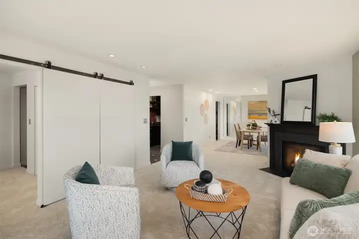 Living room, dining room and kitchen in the back, with third bedroom / flex room on the left