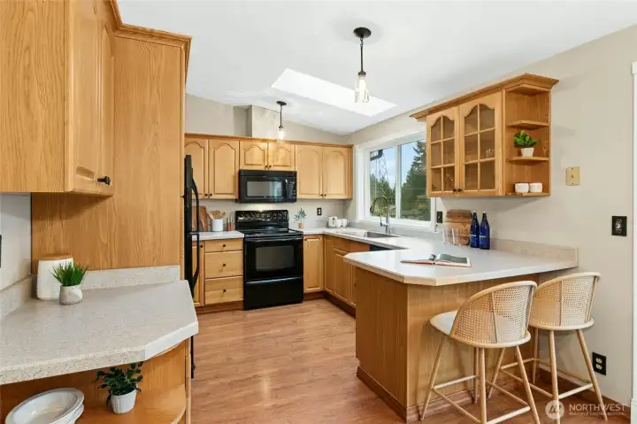 Counter bar makes a great perch for homework or visit with the chef