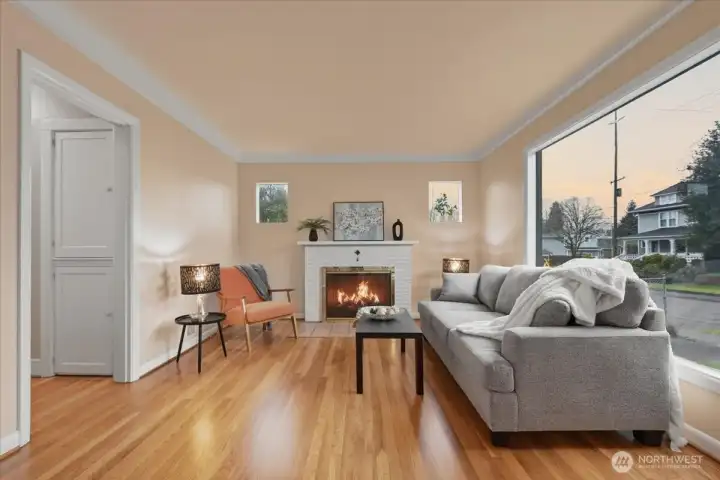 Living room, hardwood floors, wood fireplace, coved ceilings
