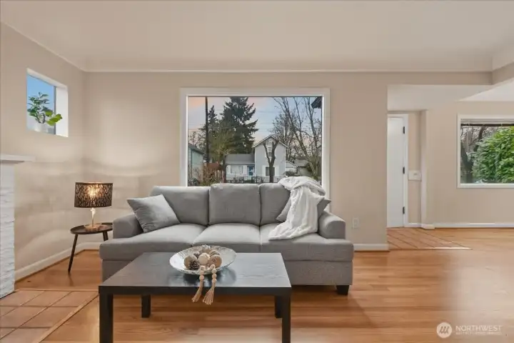 Living room, hardwood floors, wood fireplace, coved ceilings