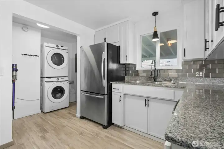 View to side door that opens to carport and back yard.
