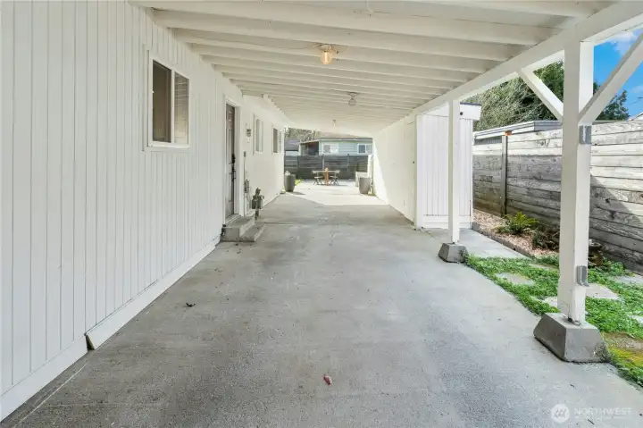 You can fit 2 cars tandem for covered parking plus 2 additional uncovered.