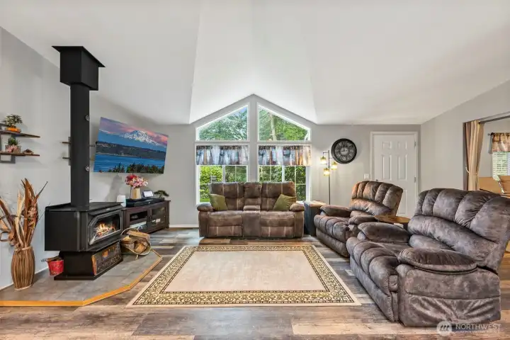 Vaulted ceilings and large windows allow in plenty of natural light.