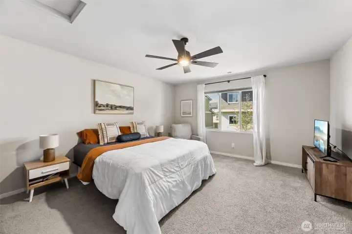 Up the stairs you have the generously sized primary bedroom