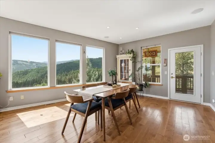 A refined main dining area perfectly positioned to capture stunning views.