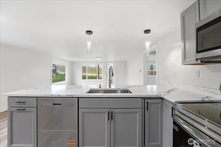 Slow closed cabinetry and drawers with blakc hardware