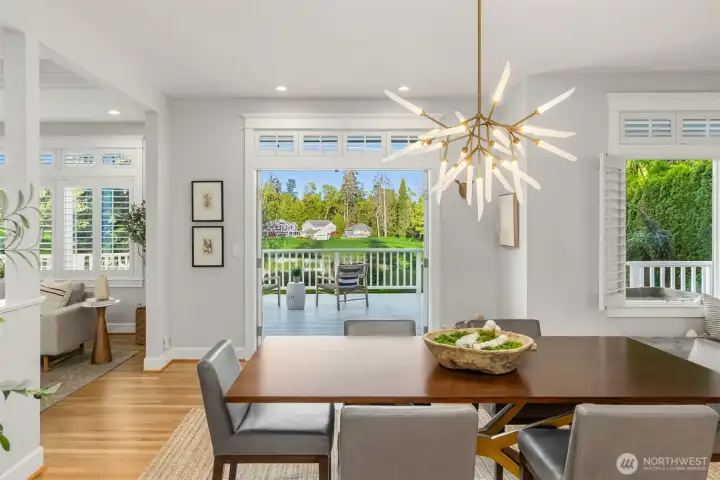 French doors open out to the back deck for great flow while entertaining.