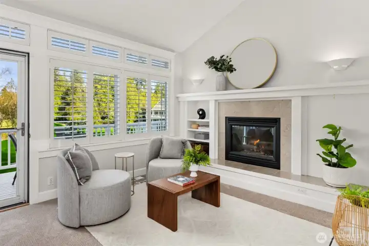 This wonderful space has a cozy propane fireplace with built-ins plus direct access out to the back deck.