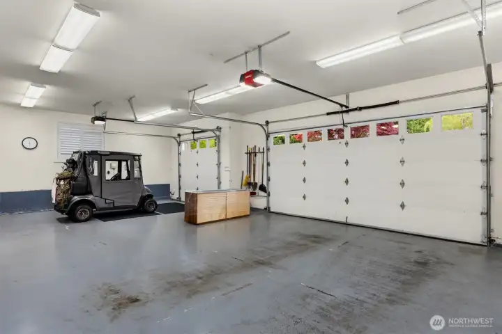 The finsihed and heated 3-car garage. Both doors have auto-openers and there is handy built-in cabinetry.