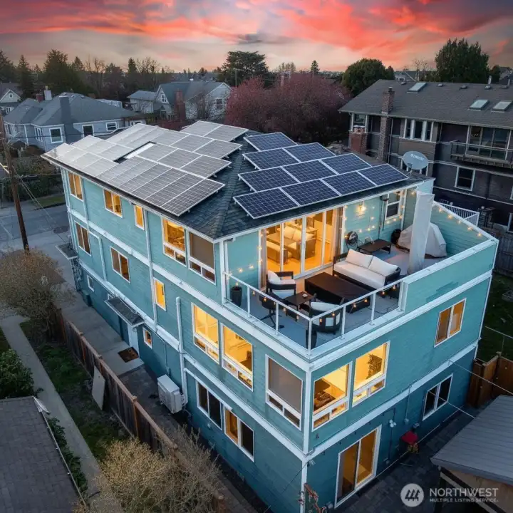 Corner View of House Backyard and SOLAR PANELS.