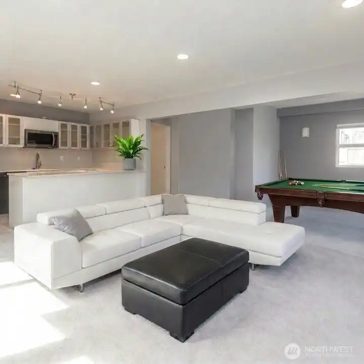 Basement living area and kitchen