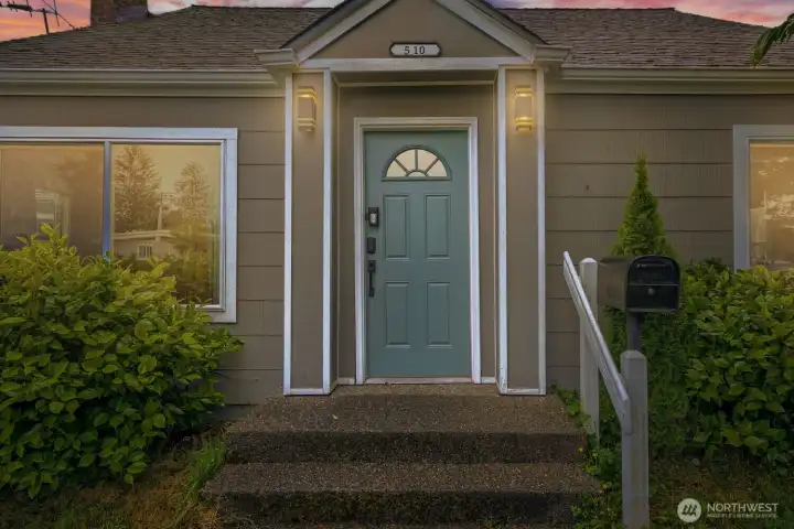 Twilight view of the front porch