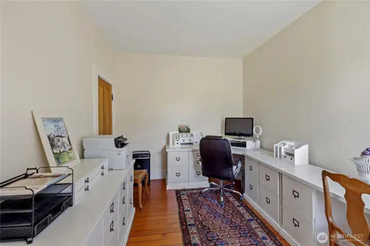 Hidden office suite connected to lower living room