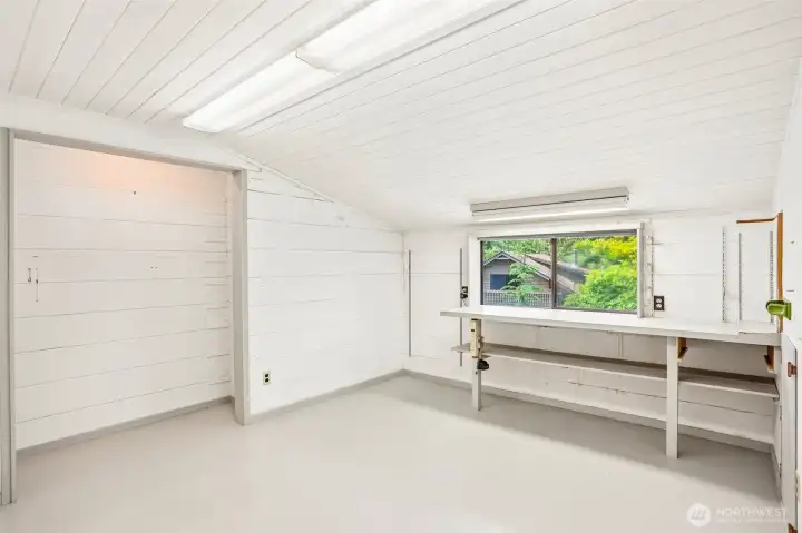 Upper level room overlooking the detached garage loft.