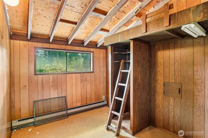 Partially finished room on upper level.
