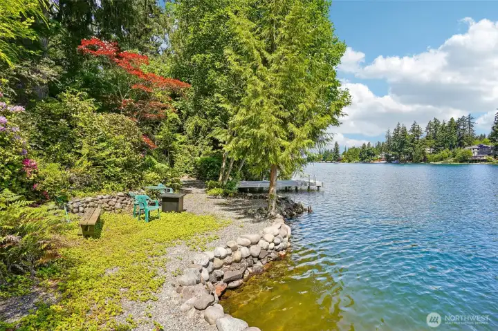 Bulkhead, dock, level sitting area at end of trail.