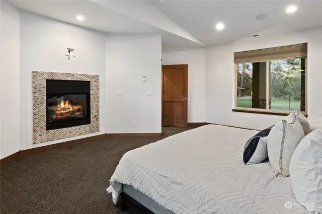 Primary bedroom with gas fireplace