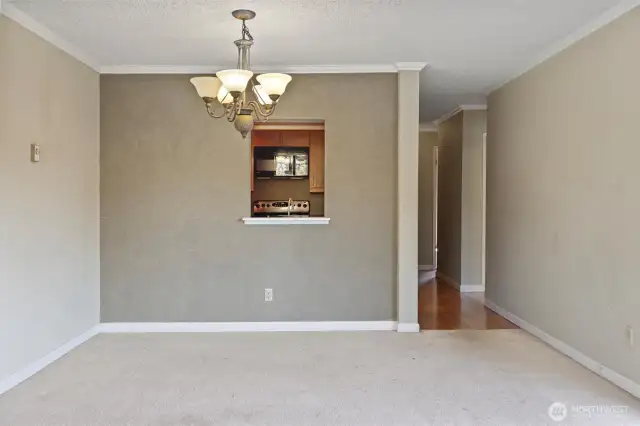 Dining area with pass thru to kitchen.