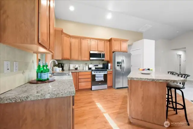Plenty of counter space and a nice breakfast bar on the island is a great place to bake or entertain.
