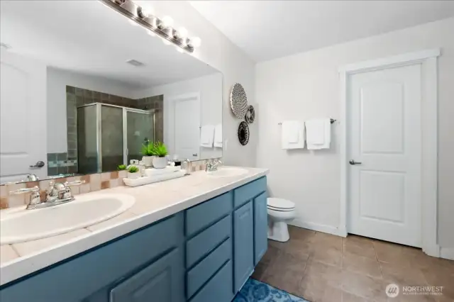 Primary bath is a 5-piece bath and has a large walk-in closet.