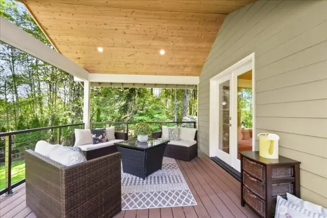 The back deck is partially covered and the perfect place to enjoy your company.