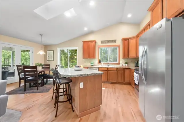 Kitchen has granite counters, SS appliances and beautiful cabinetry.  The real hardwood floors were just refinished!