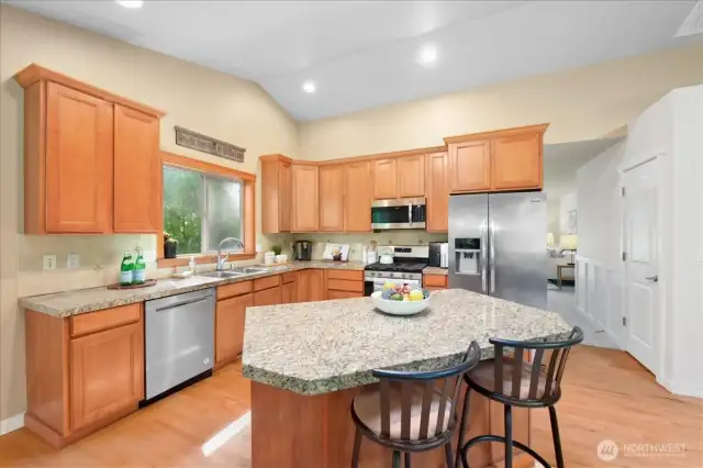 Gas cooktop is a chef's dream!  There is a pantry behind the white door on right.