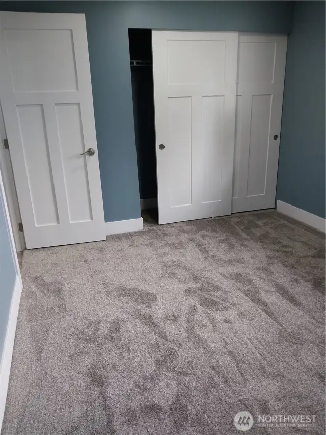Very nice, raised panel doors throughout and wall to wall carpets in the bedrooms.