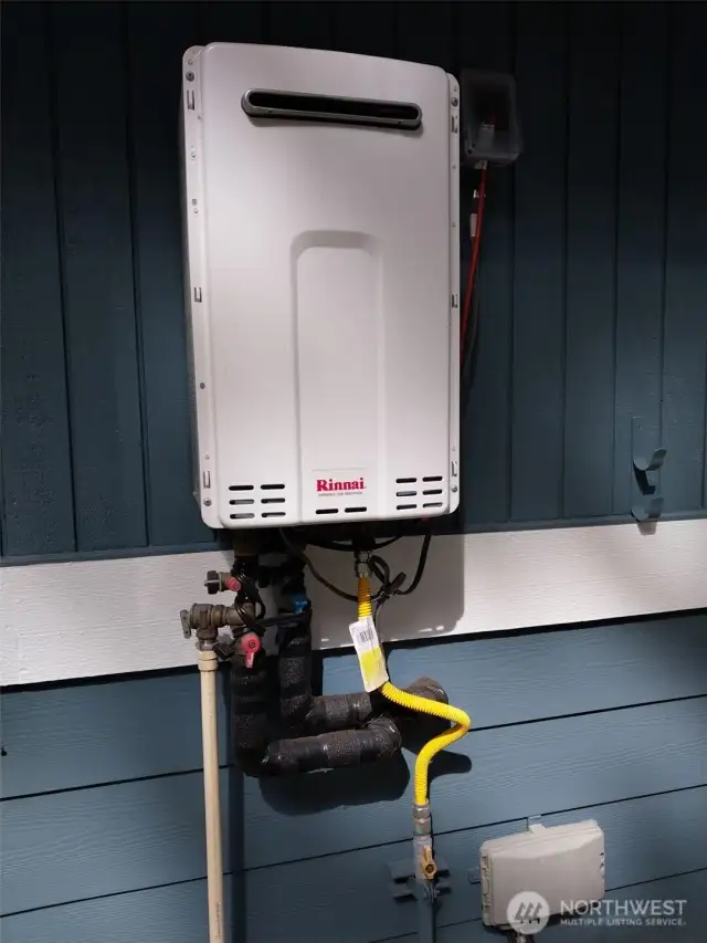 Brand new tankless gas hot water system.