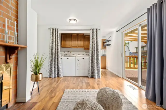 Laundry and water heater situated in the family room.