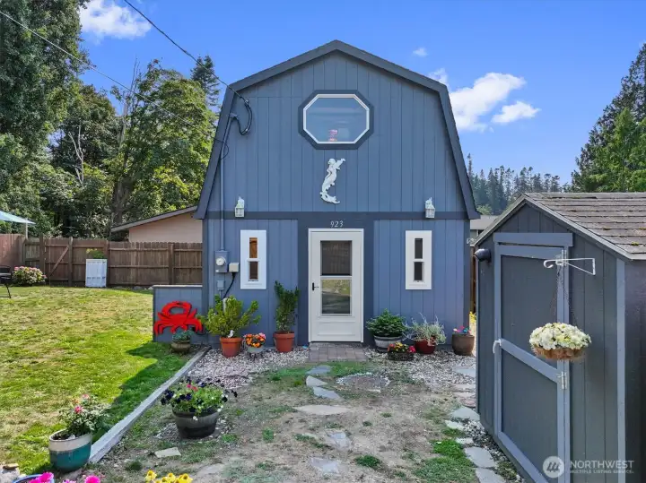 Cabin Entrance with storage shed.