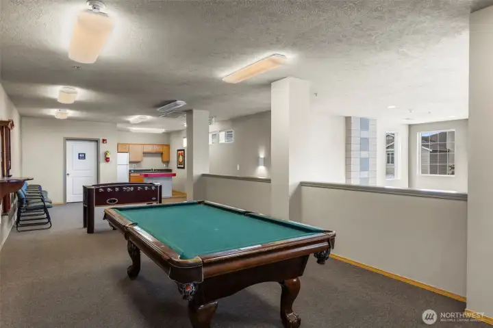 Upper floor is the game room area and kitchenette