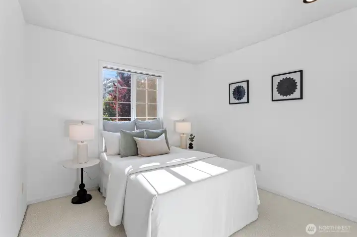 The second bedroom overlooks the beautiful front gardens.