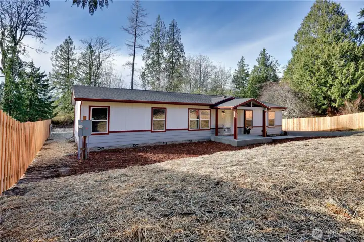 Brand new home on a half acre with fencing on both sides for back yard privacy.