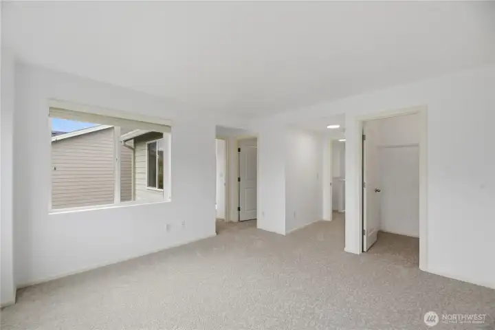 Primary bedroom with walk in closets