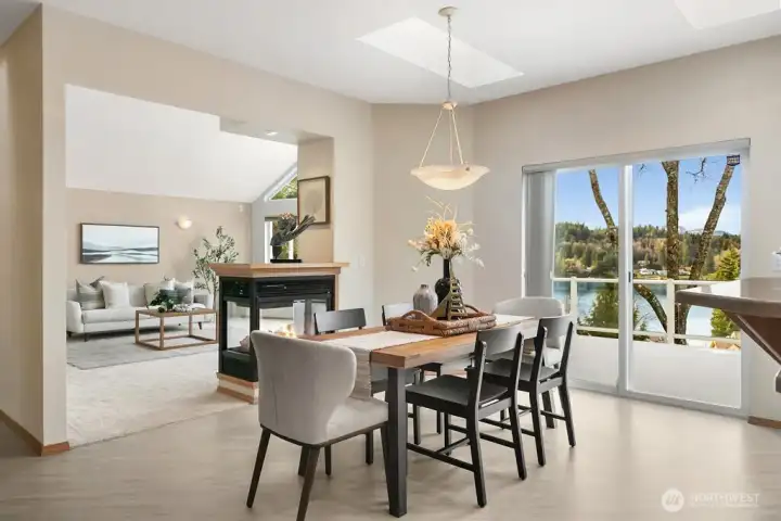 Gas fireplace is thoughtfully located between dinning are and main living.