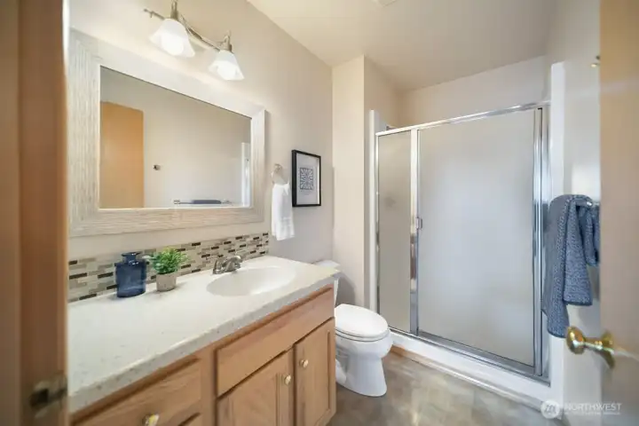Lower level 3/4 bath off the rec room and adjacent to 2 bedrooms.
