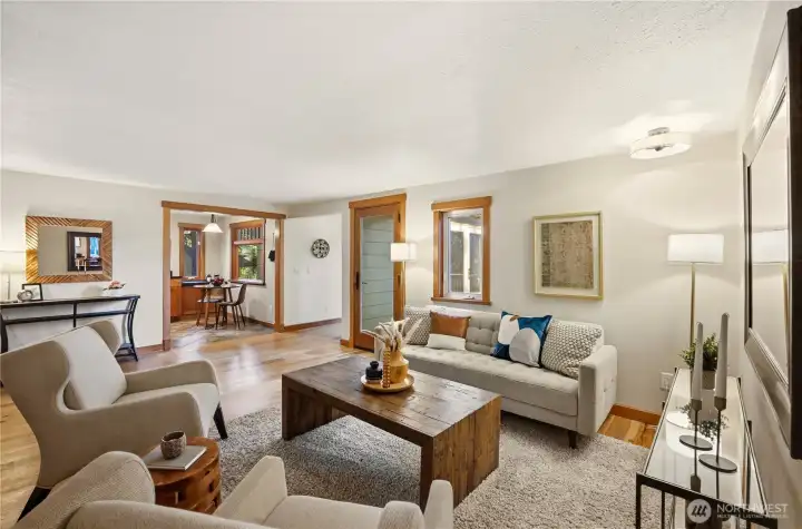 Living area with hickory wood floors.