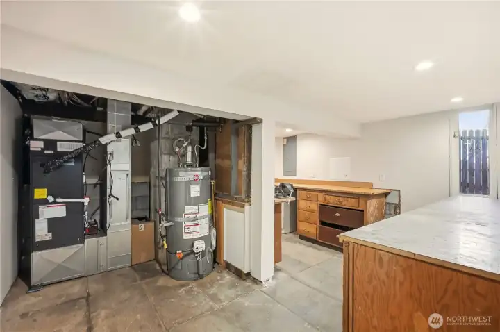 Basement storage, water heater, and workshop