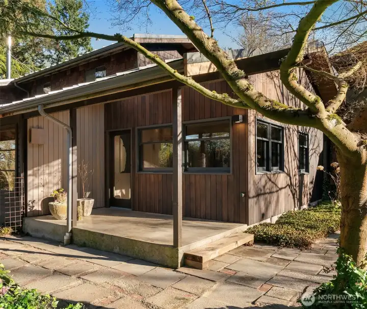 Substantial covered entry off the courtyard.
