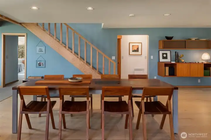 The dining area is the heart of the home, with seamless egress to every room.