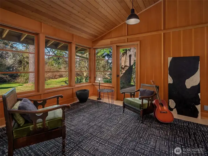 Fir panel clad sitting room on the north side of the home.